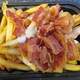 Illustration for article titled Fast-Food Smackdown: McDonalds Mozzarella Sticks Vs. Wendys Bacon Fondue Fries